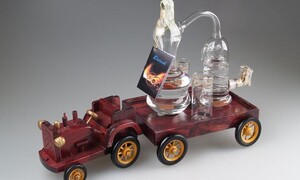 Traktor + destilačn&iacute; př&iacute;stroj &scaron;vestka 40% 0,35L 1300,-